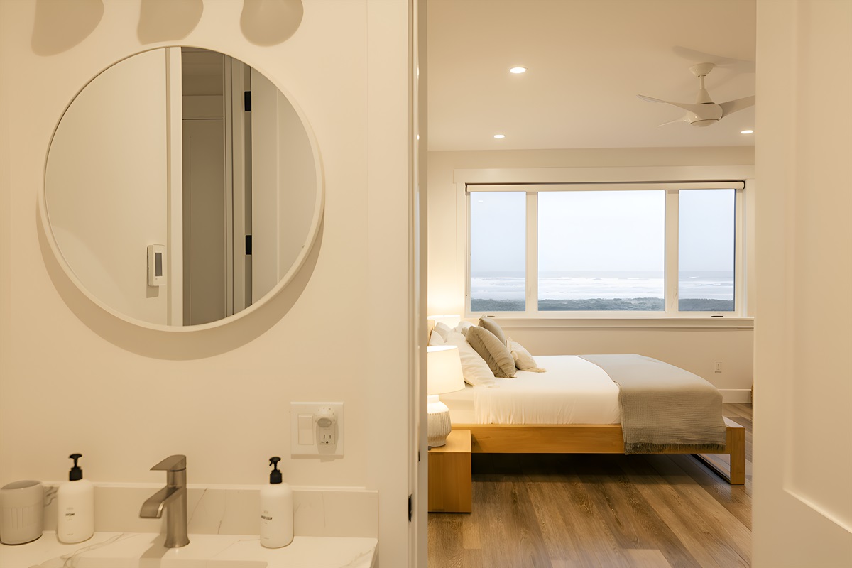 {Upstairs Ensuite Bath} Ensuite bath with heated floors and shower.