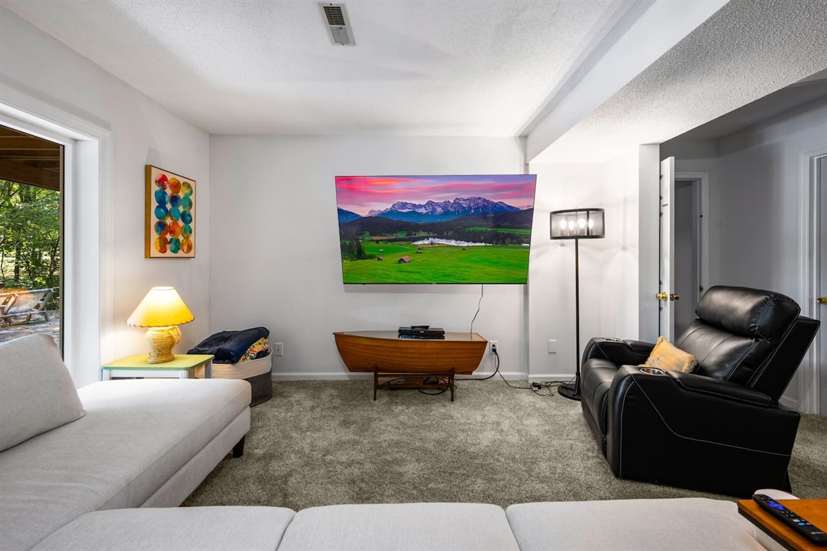 2nd living room located downstairs Infinity Game TableFlat Screen TvPlush Sectional 