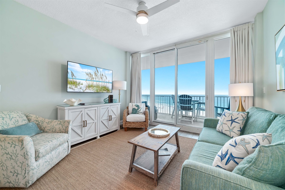 The seamless transition to the outdoor balcony enhances the sense of light and openness.