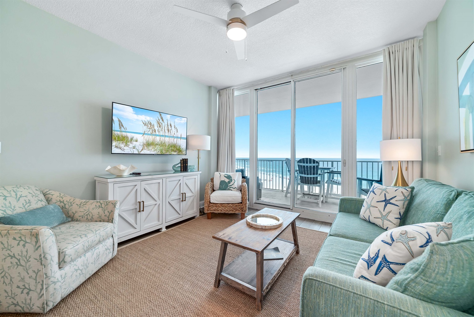 The seamless transition to the outdoor balcony enhances the sense of light and openness.