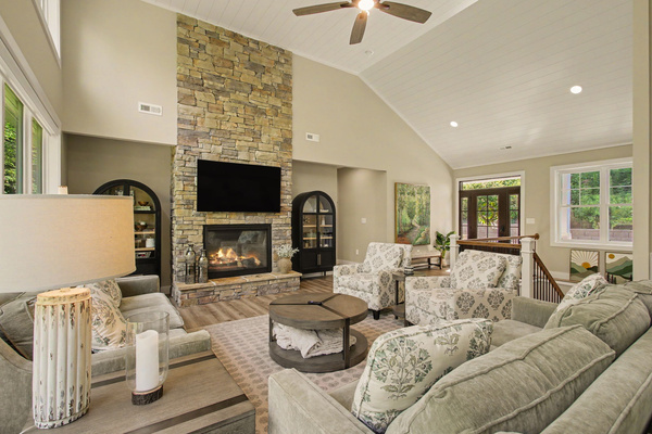 Great room seating area, fireplace, and TV