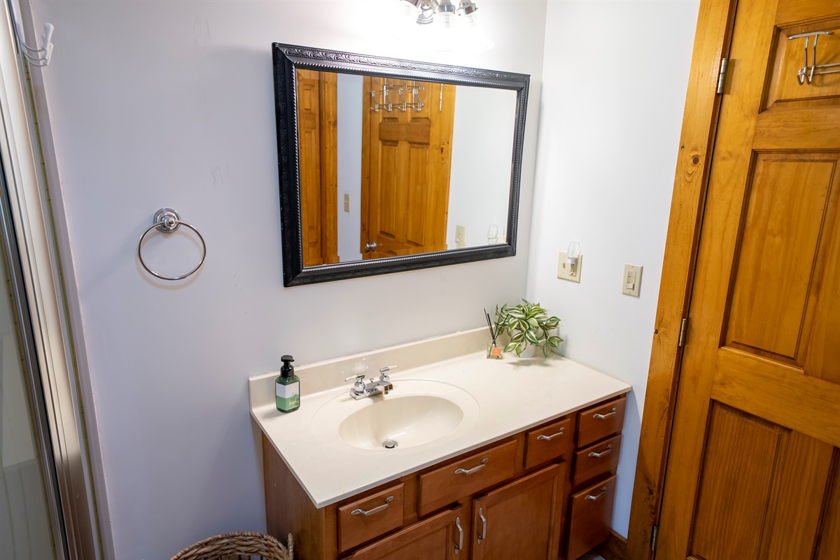Functional vanity with sink and storage, perfect for getting ready.