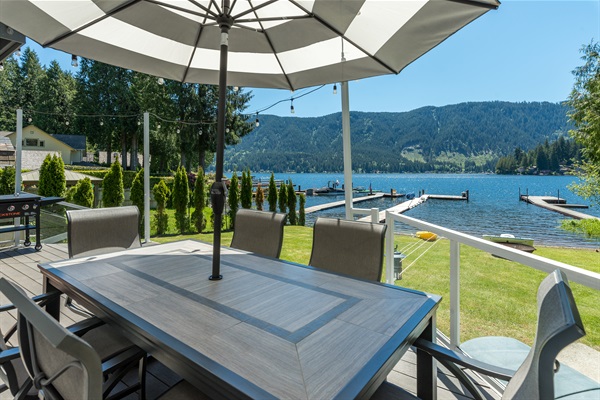 Main level deck with outdoor dining table for 6 and majestic views of the lake.
