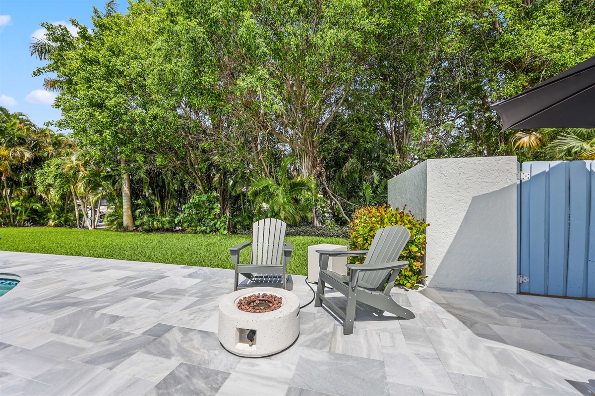 Settle into the Adirondack chairs by the pool for conversation, evening drinks, or a relaxed moment beside the fire pit area.