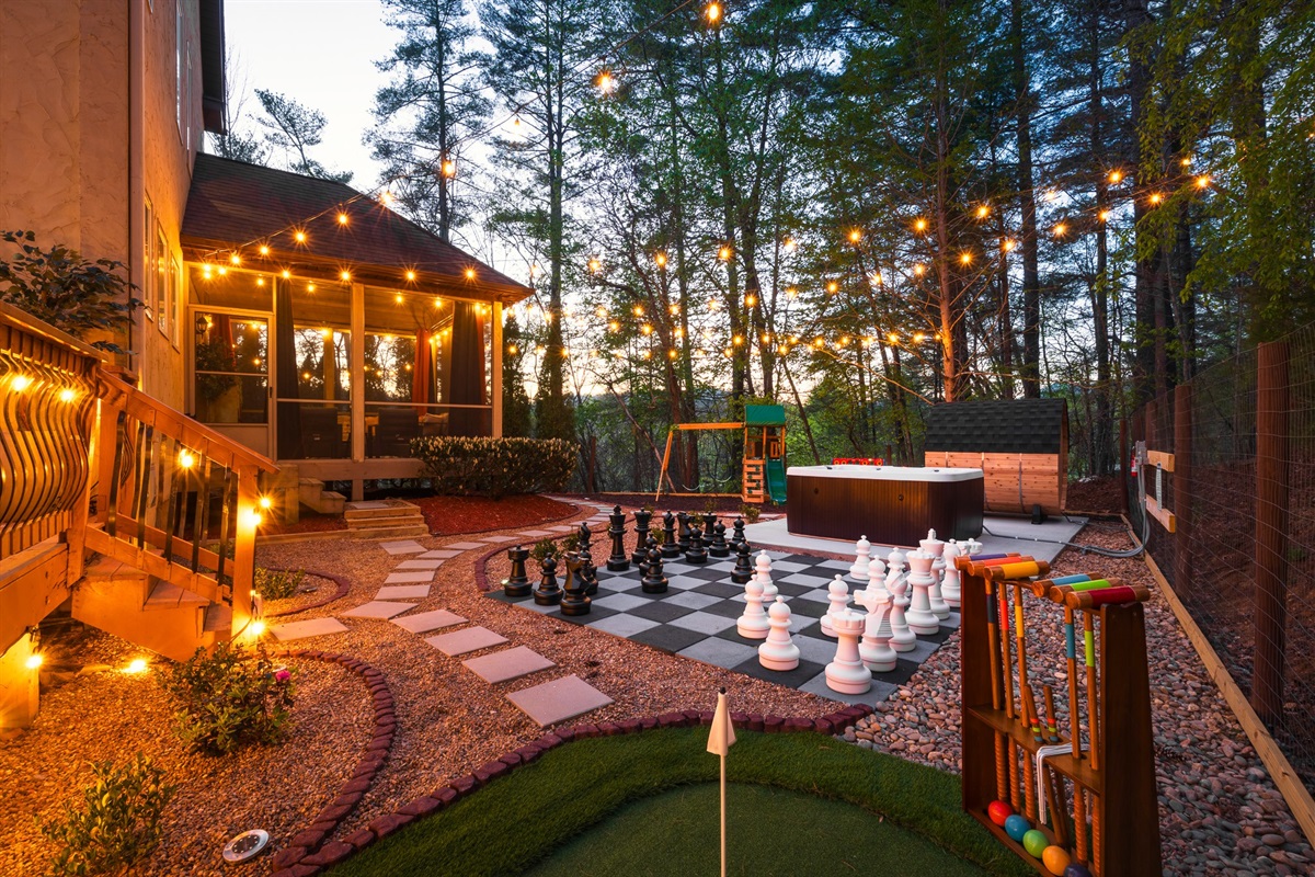Full outdoor experience with games, hot tub, and space to spread out - rare to find this much usable outdoor area this close to town