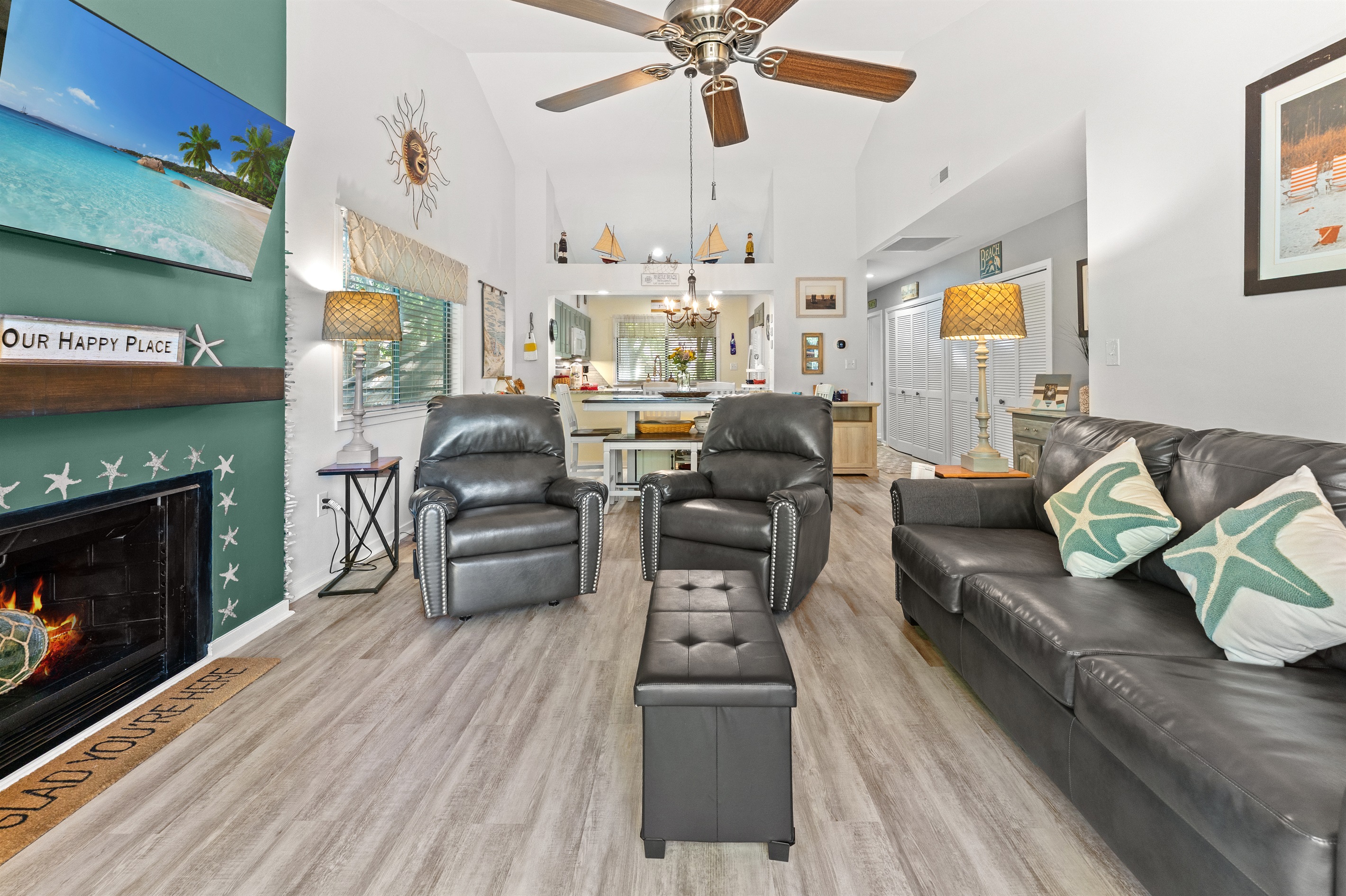 Large open Living room with large TV and patio access