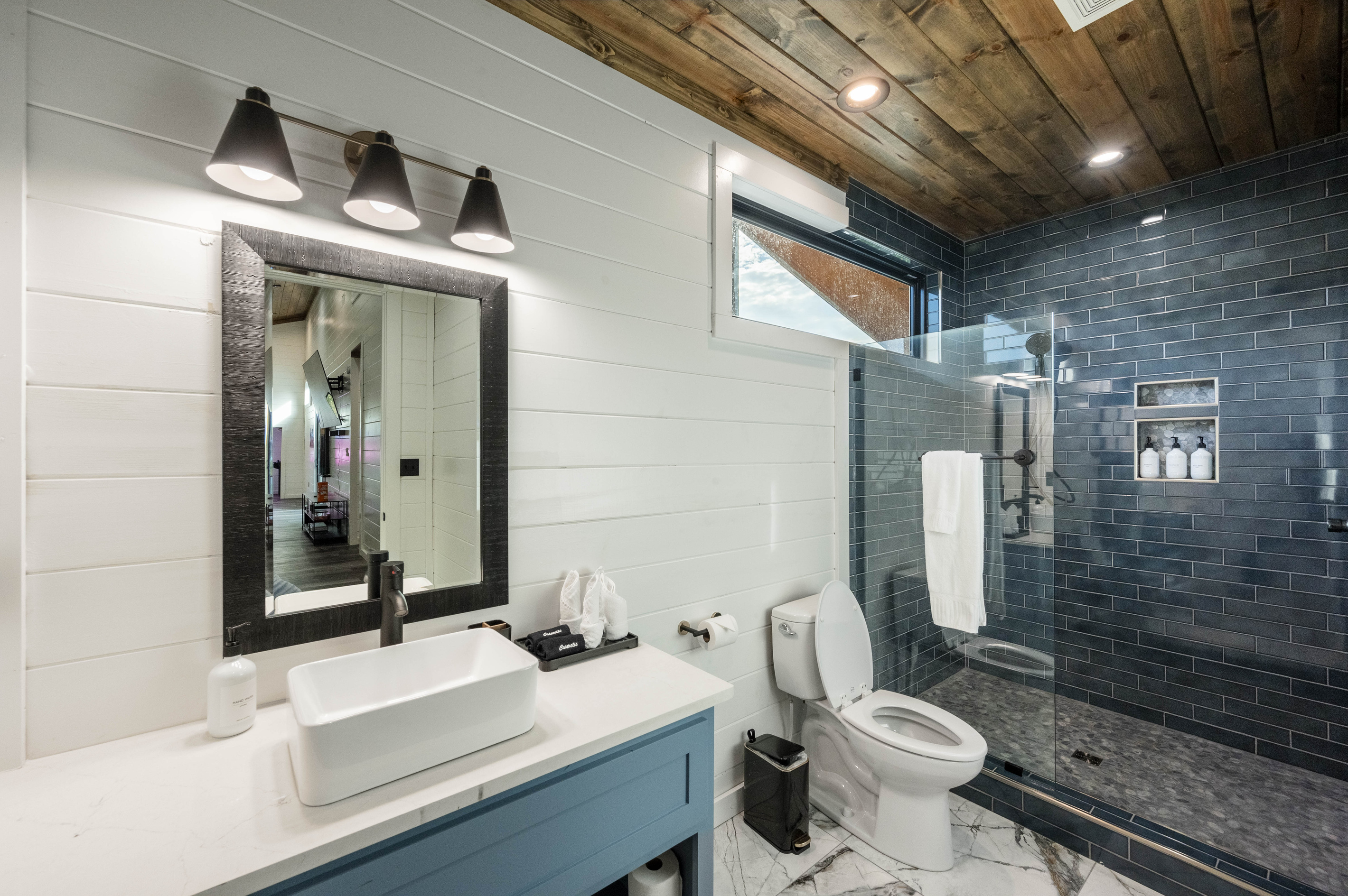 Enjoy spa-like experience in our modern bathroom featuring a spacious double vanity, stylish finishes and thoughtful amenities for your comfort and convenience