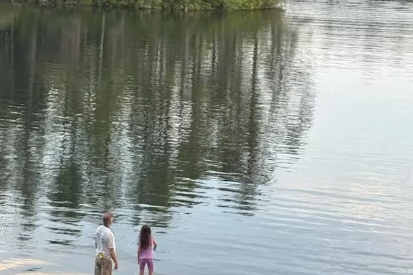 Fly fishing lessons at dusk.  The perfect ending to a wonderful family day