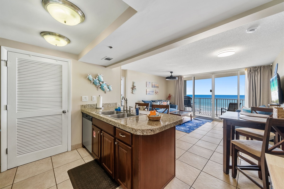 Open floorplan and beach views from kitchen, living and dining room