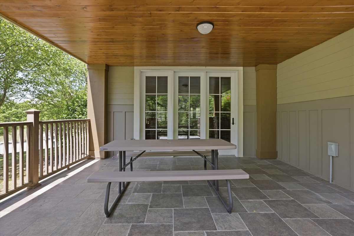 Step out onto the covered porch and enjoy fresh mountain air from your own picnic table, perfect for morning coffee or a relaxed meal outside.