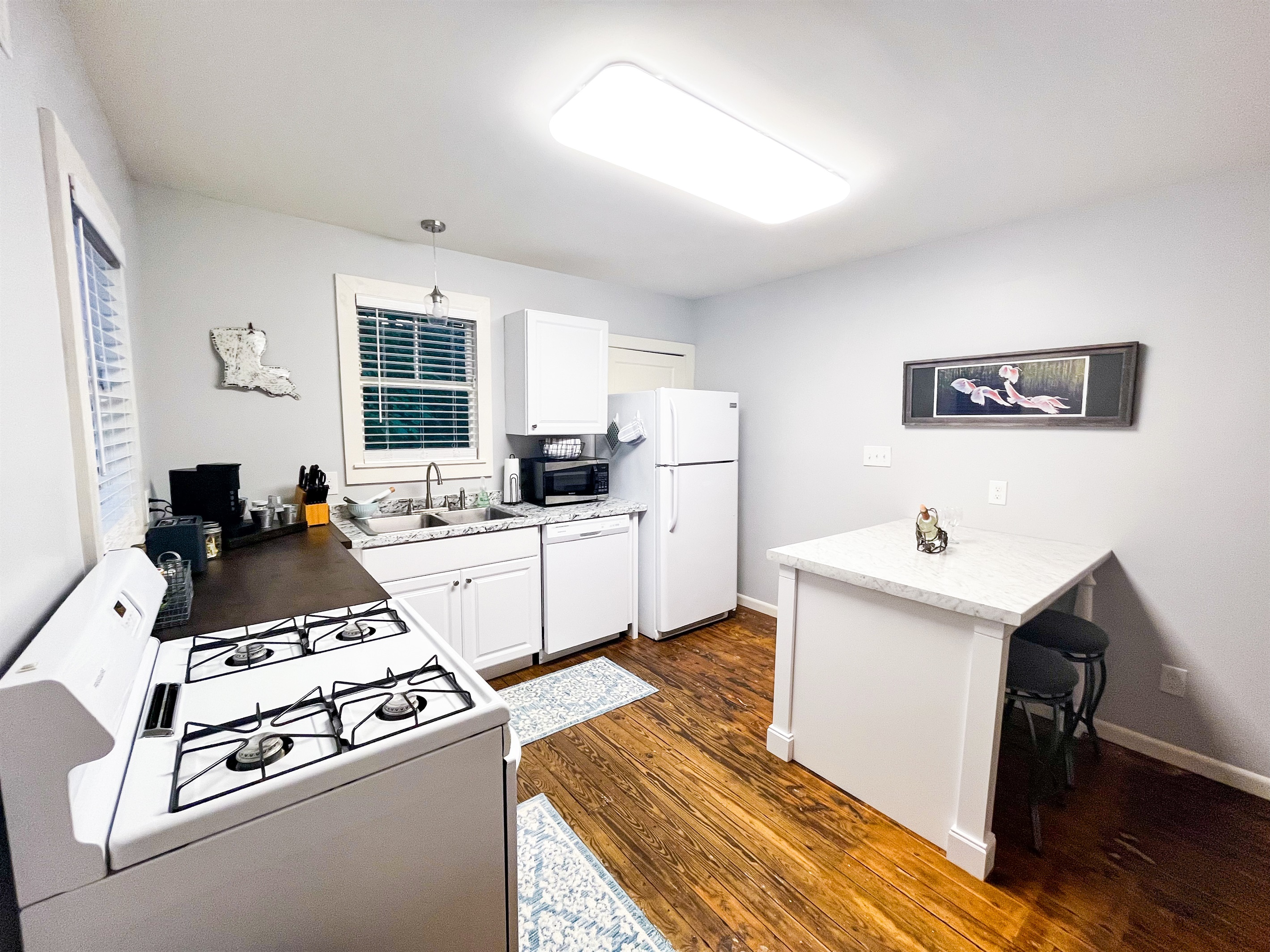 Fully stocked kitchen for your cooking needs.