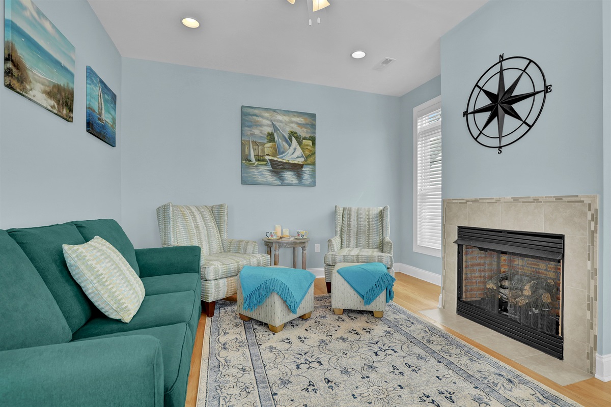 Cozy up by the fireplace in the secondary living area for a movie night.