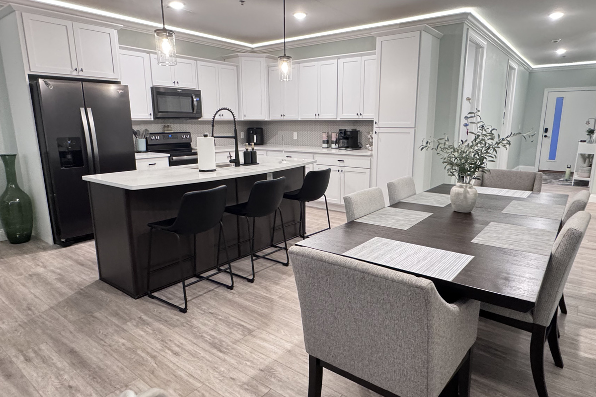 Large open concept and fully stocked kitchen with plenty of seating and entertainment.