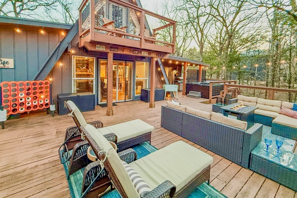 800 sf Deck | Fire table | Outdoor Cooler | Gas Grill (Propane Provided) | Private Hot Tub | Tons of Outdoor Games | Private Wooded Views | String Lights