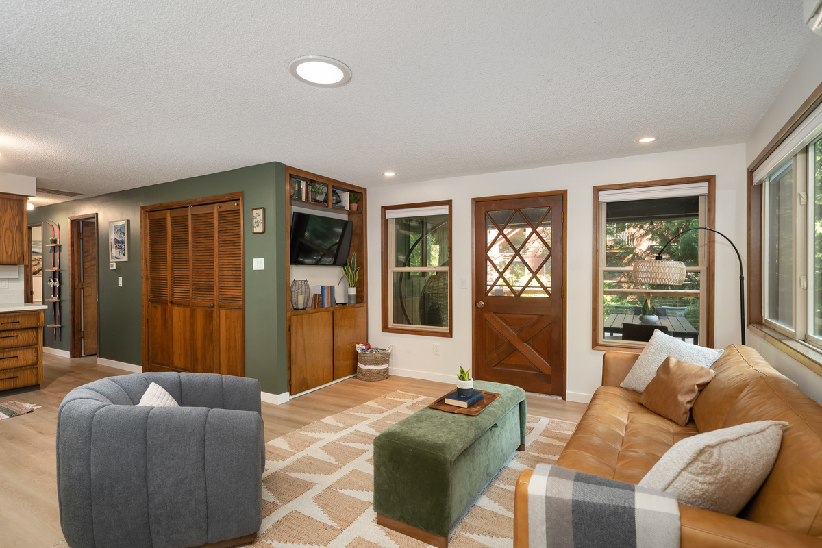 Movie night meets mountain charm in this cozy, character-filled living space.