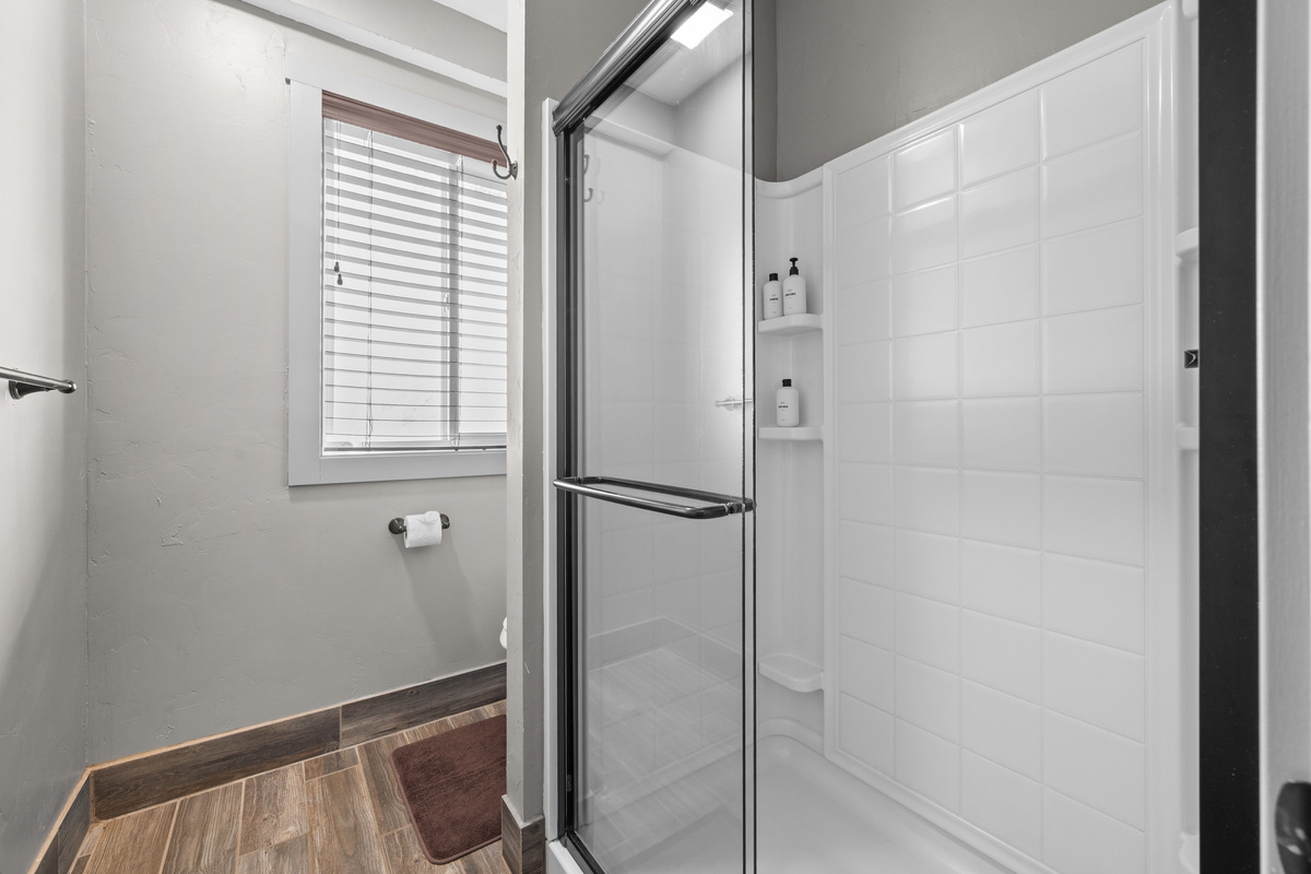 Sliding Glass Shower door, we provide towels, shampoo, conditioner, and soap.