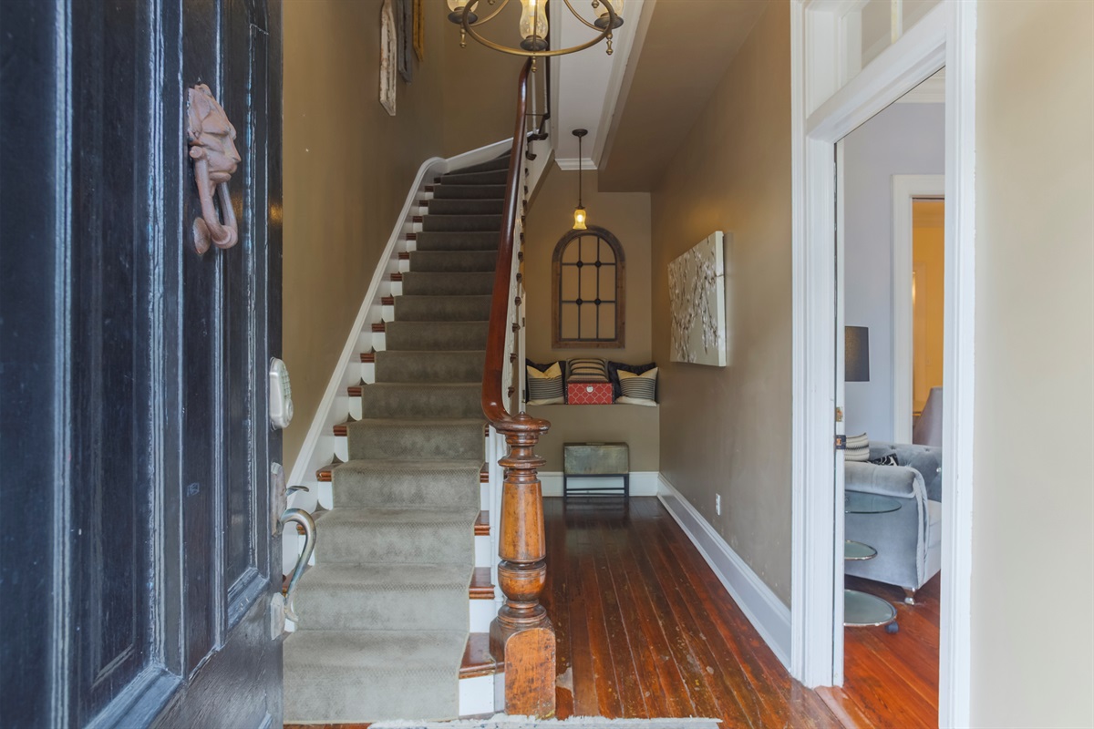 Step through the shared hallway into your private first-floor retreat in the heart of the Historic District.