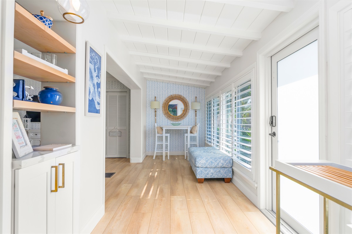 A grand hallway entrance with plenty of space to drop your bags and start your vacation.