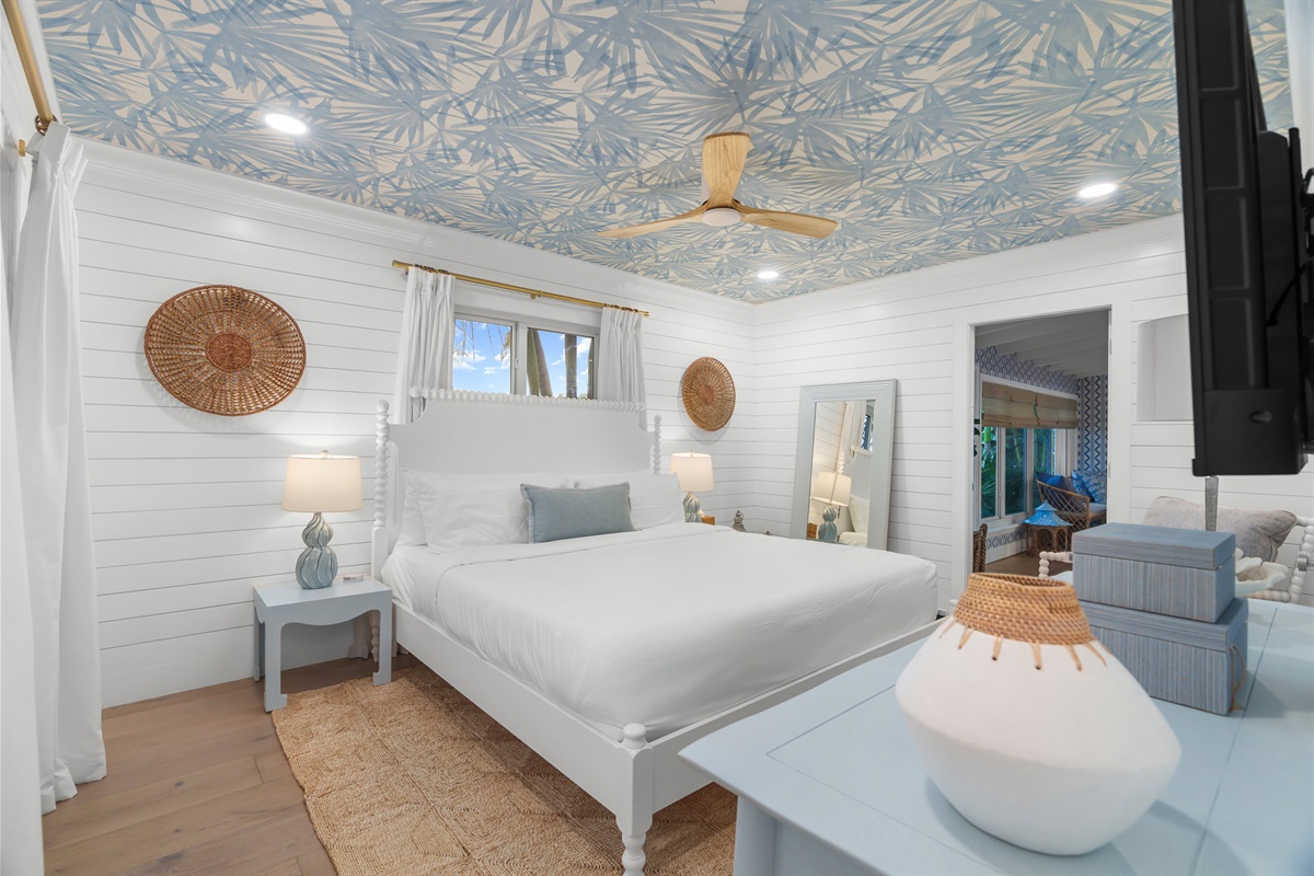 This calming retreat features a spacious king bed, soft textures, and a light, coastal-inspired look for a truly restful stay.