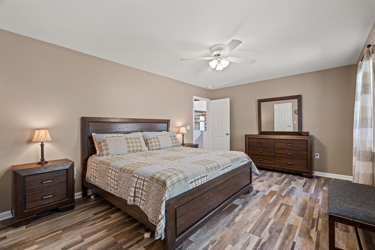 Master bedroom with king bed, private bath and large closet
