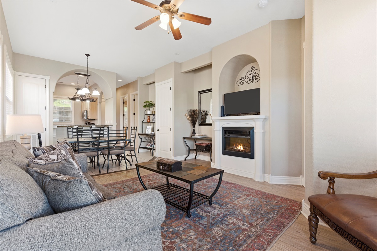 Come home to this inviting living room and unwind after exploring.