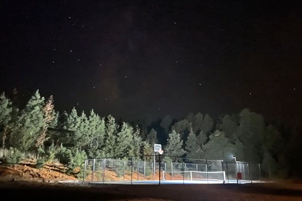 Nighttime views from the sport courts under a sky full of stars—official dark-sky area.