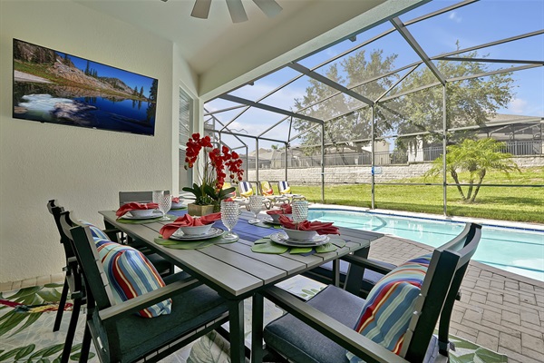 Poolside dining & TV lounge — your perfect Florida retreat.