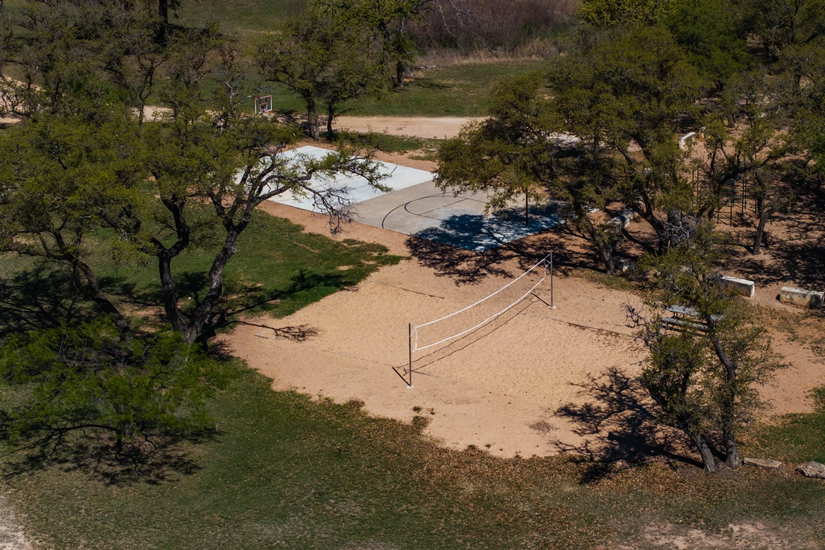 Volleyball and basketball courts in Point Venture Private Park. 
