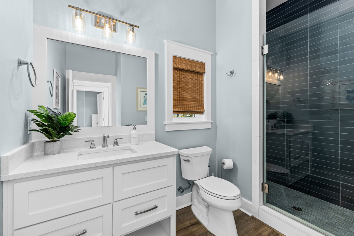 Modern finishes and a spacious walk-in shower provide comfort and convenience throughout your stay.