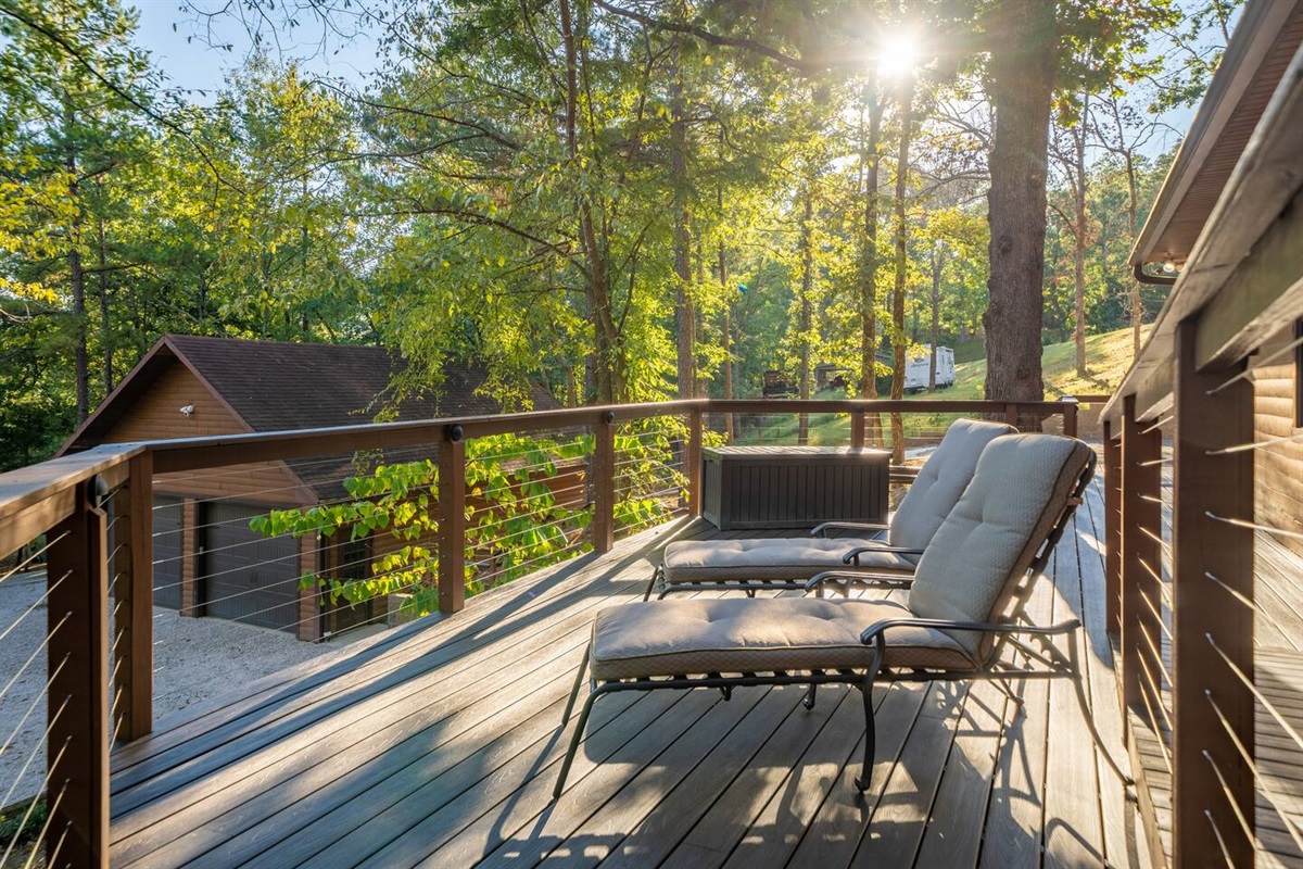Rest and relax in nature on the front Deck with a view of the Lake.  
