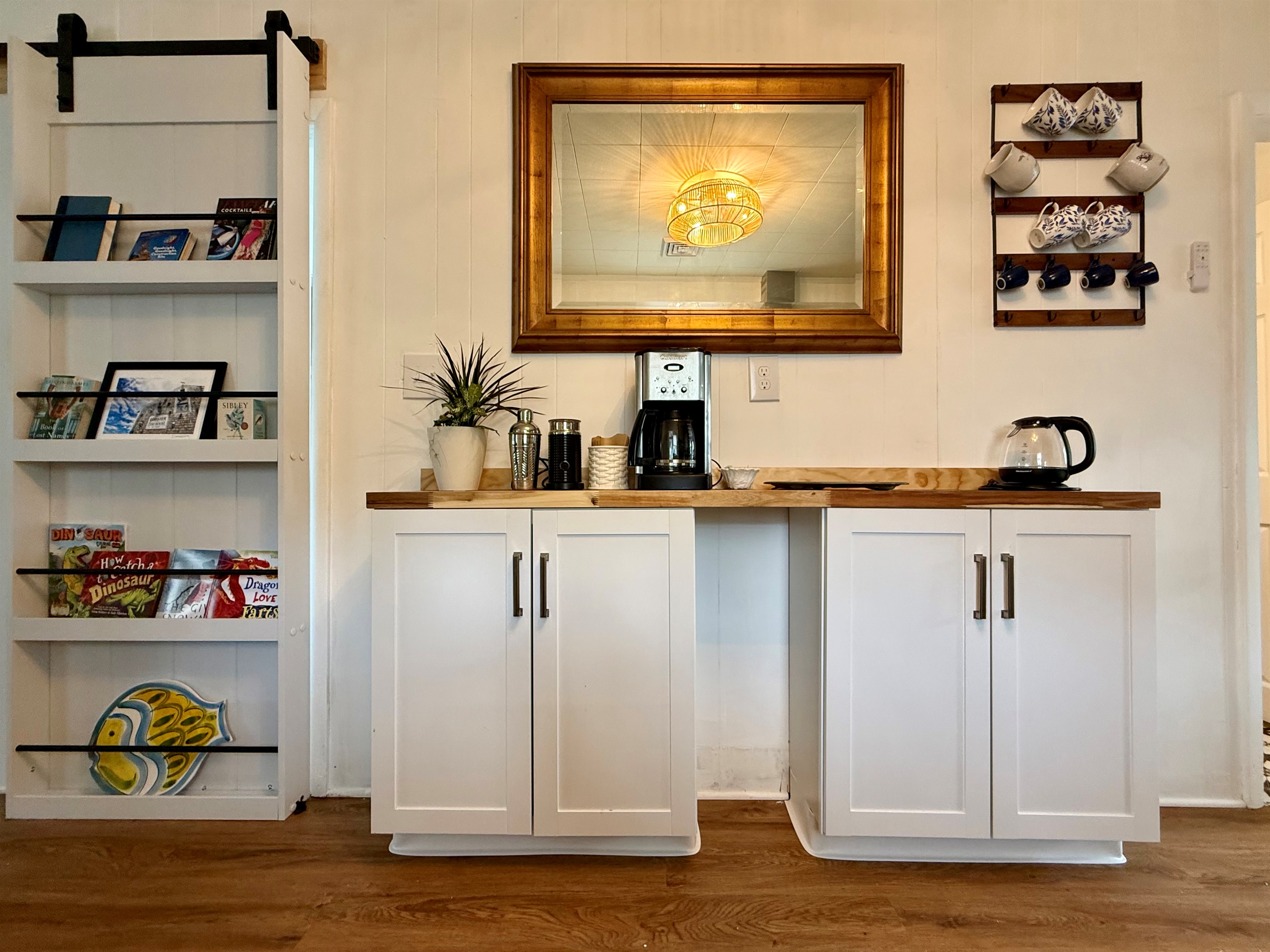 the doors to the bedrooms are sliding bookcases! 