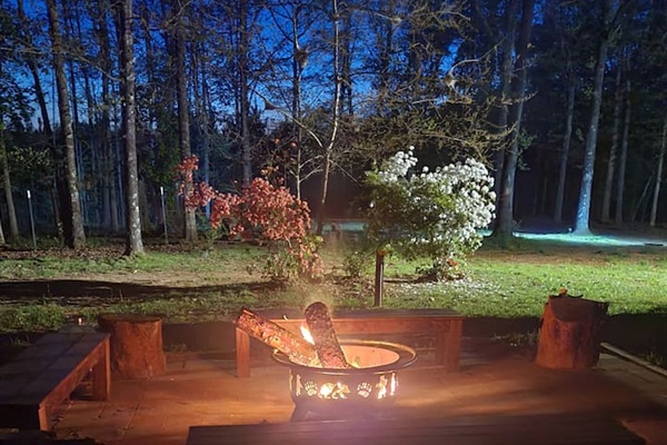 Fire Pit Retreat: Gather around the flickering flames and enjoy starry nights in nature's embrace!