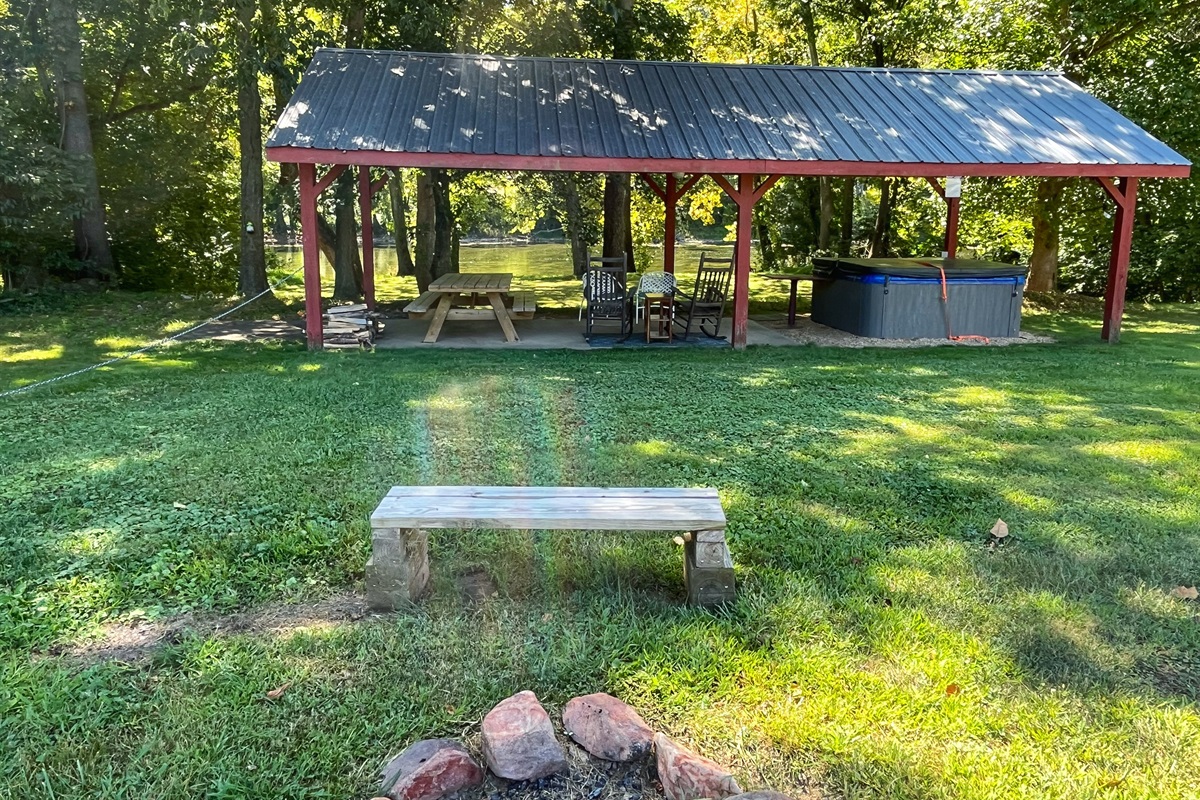 Enjoy a relaxing soak in the pool house hot tub, surrounded by nature! 😊