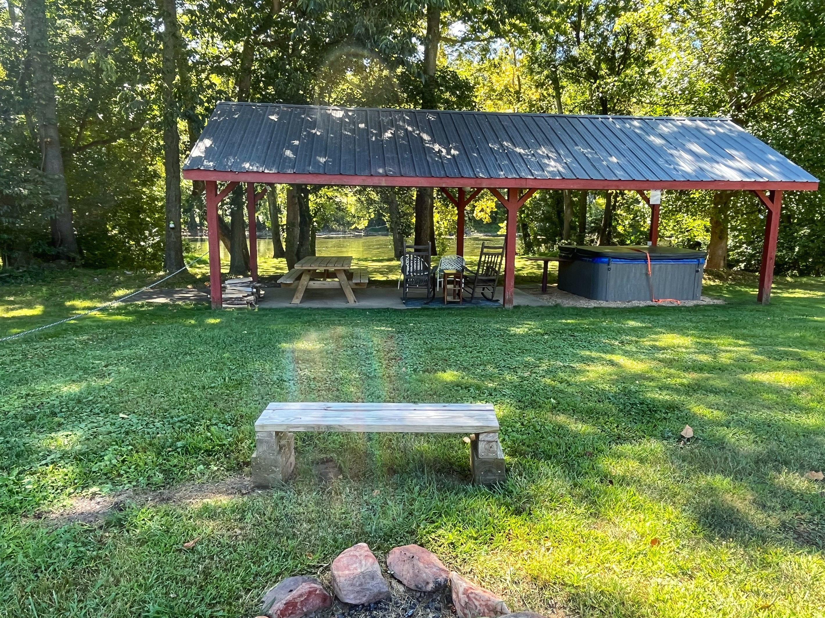 Enjoy a relaxing soak in the pool house hot tub, surrounded by nature! 😊