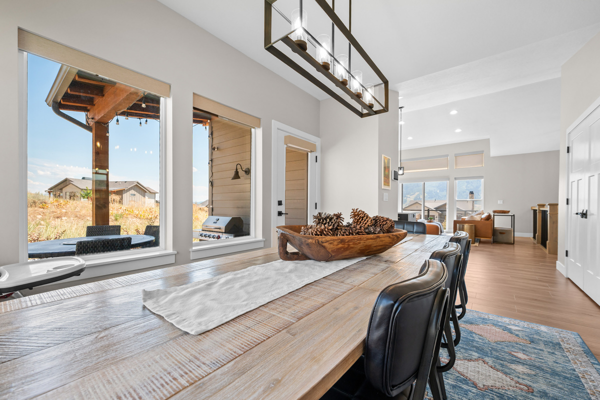 Enjoy meals with mountain views and easy access to the covered patio for indoor-outdoor dining.