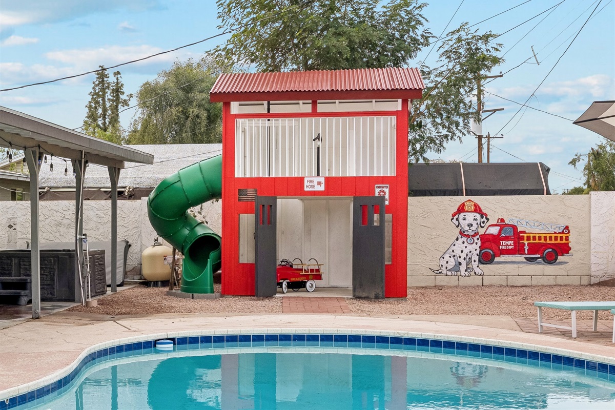 Fire-station themed kids’ play area — hours of backyard fun