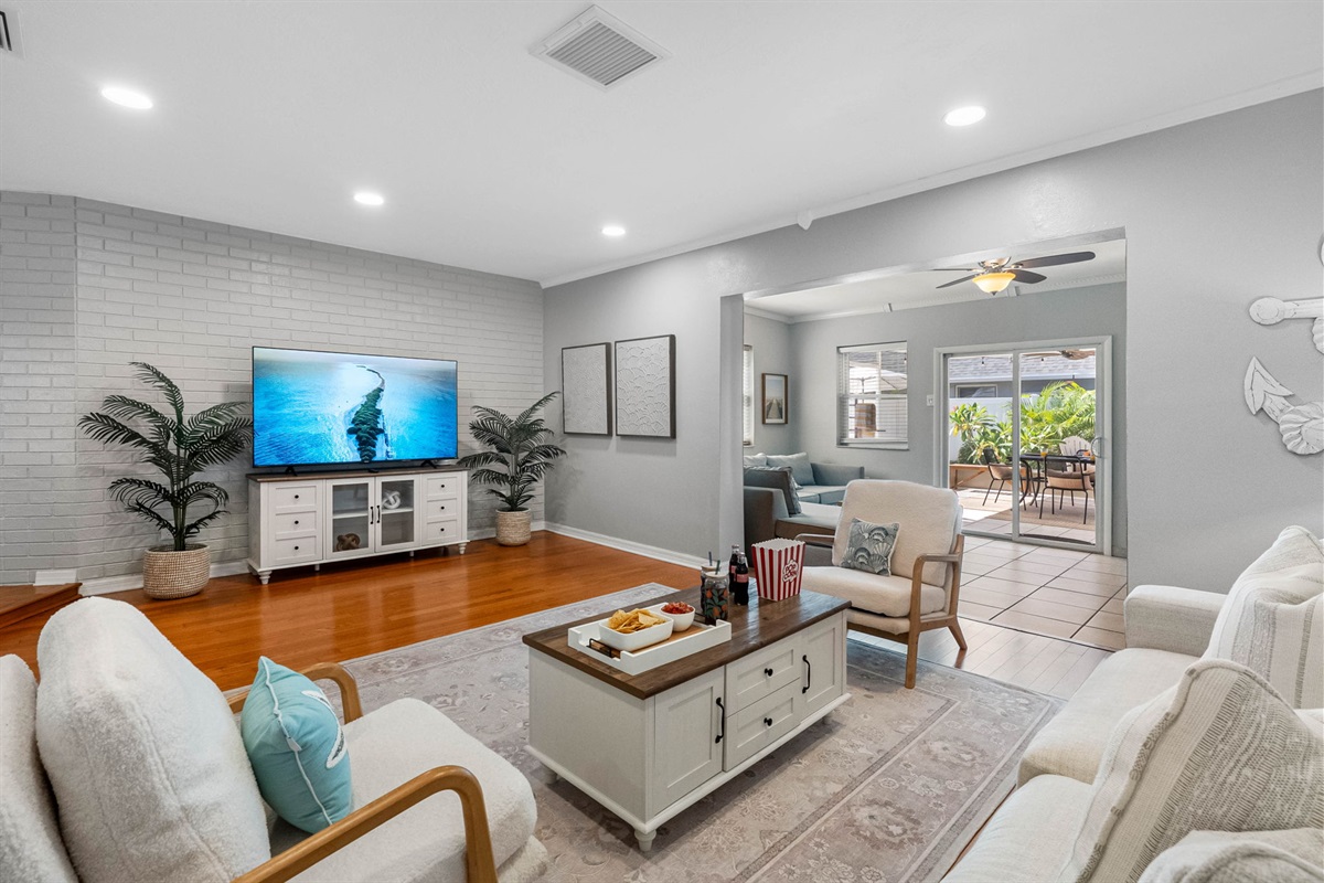 Designed with comfort in mind, this living room includes plenty of seating for the whole crew to gather, relax, and reconnect.