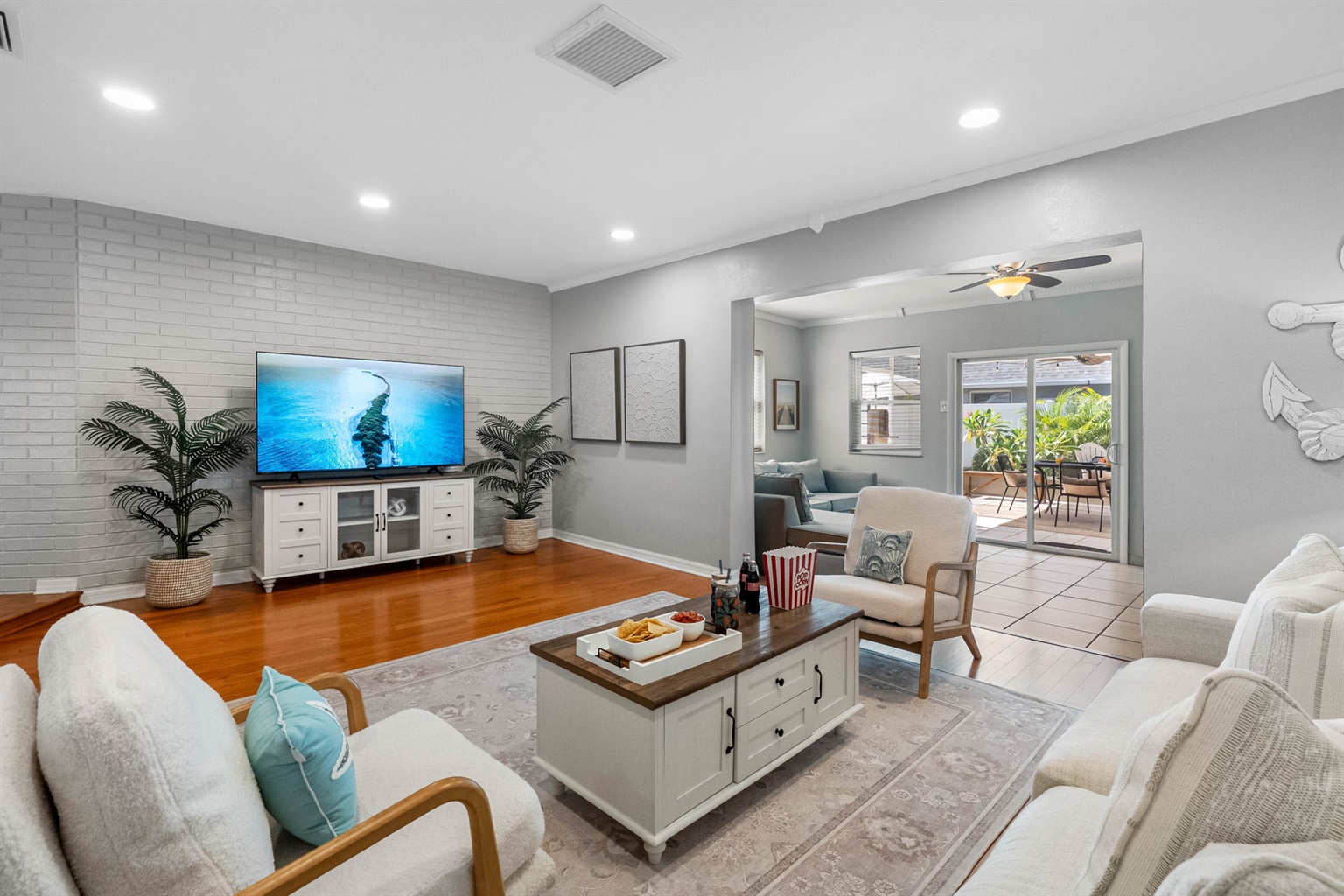 Designed with comfort in mind, this living room includes plenty of seating for the whole crew to gather, relax, and reconnect.