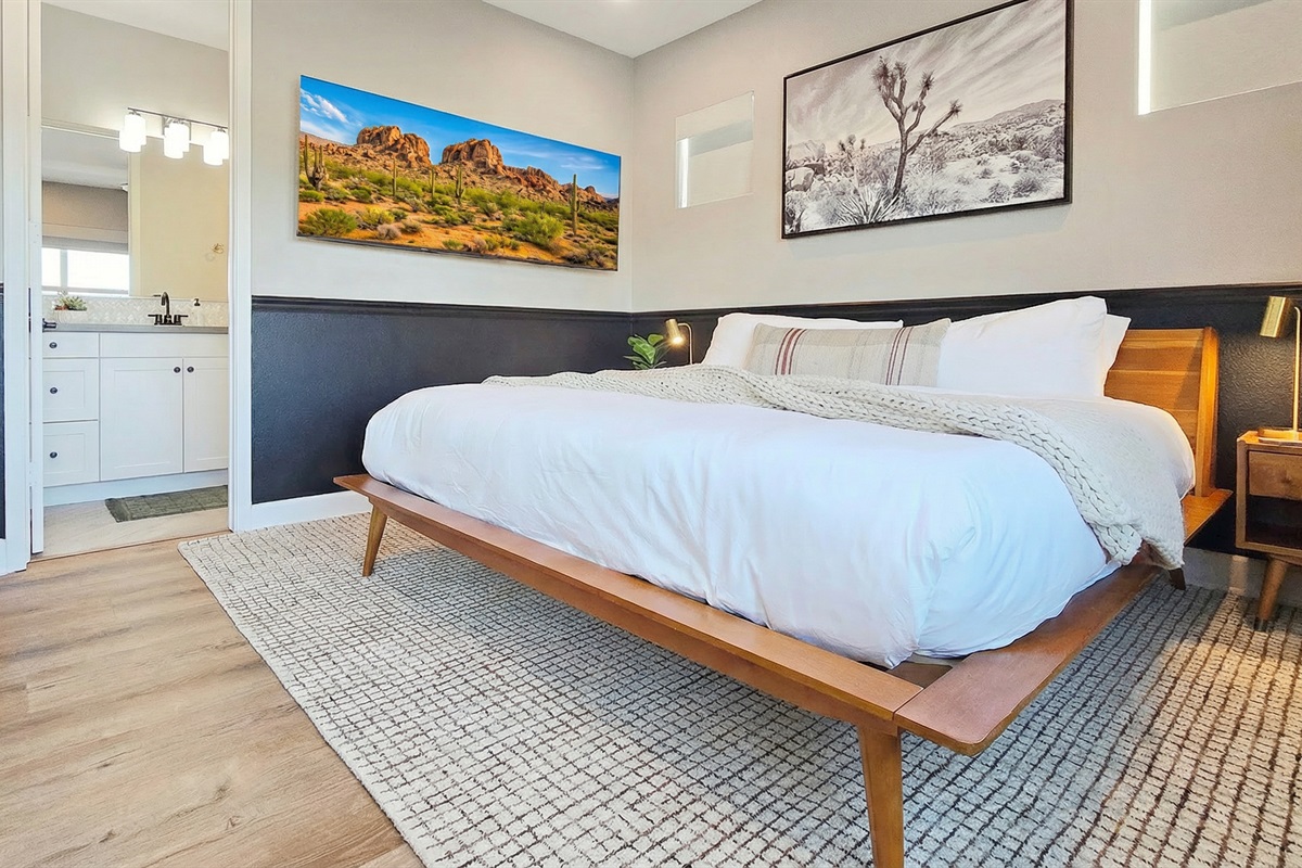 Bedroom #2 - 2nd floor, king-sized bed, ceiling fan, smart TV, closet and an ensuite bathroom with bathtub/shower combo. (Sleeps 2)