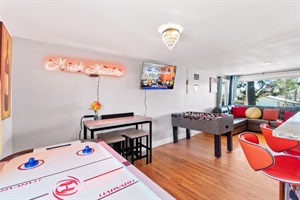 Table Thrills and Cinematic Spills: Air Hockey, Foosball, and a 50 Inch Roku TV Delight! 🏒⚽📺🌠 -
