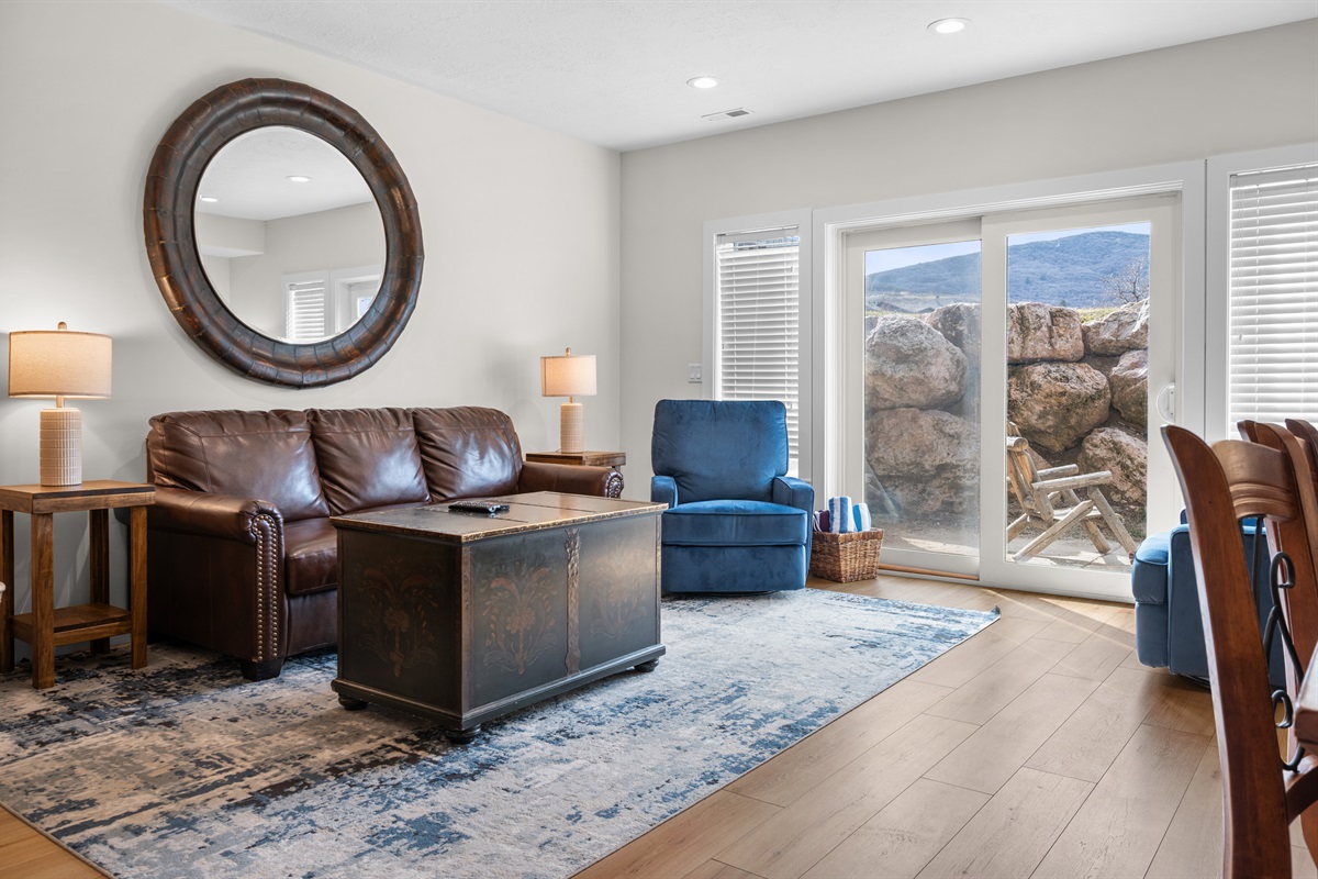 Bright and inviting lower-level living space with comfortable seating and a private entrance.