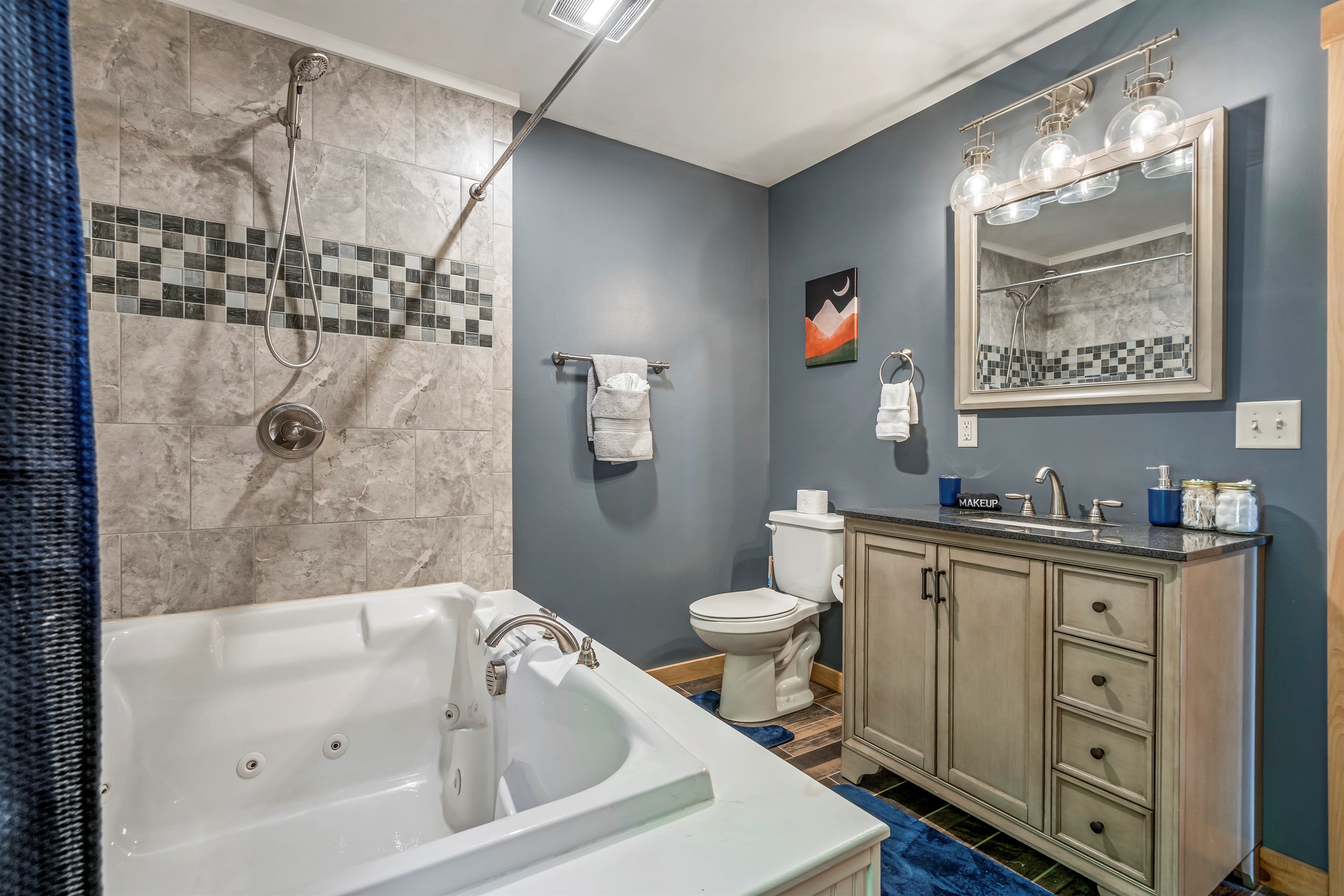 Treat yourself to a spa-like experience in the main floor bathroom, featuring a deep jacuzzi tub.