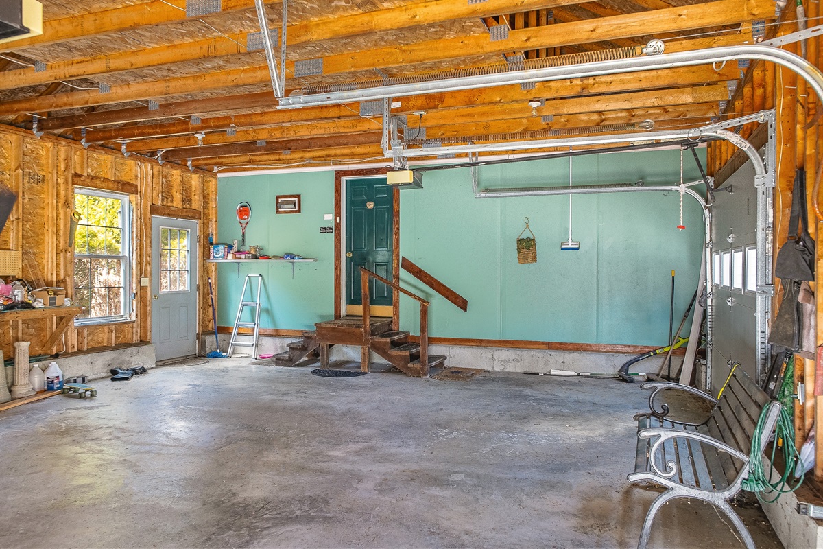 Enjoy the convenience of an attached garage, perfect for keeping your vehicle out of the elements or storing hiking gear. The interior door leads directly into the kitchen, making grocery trips and unloading equipment easy and efficient.