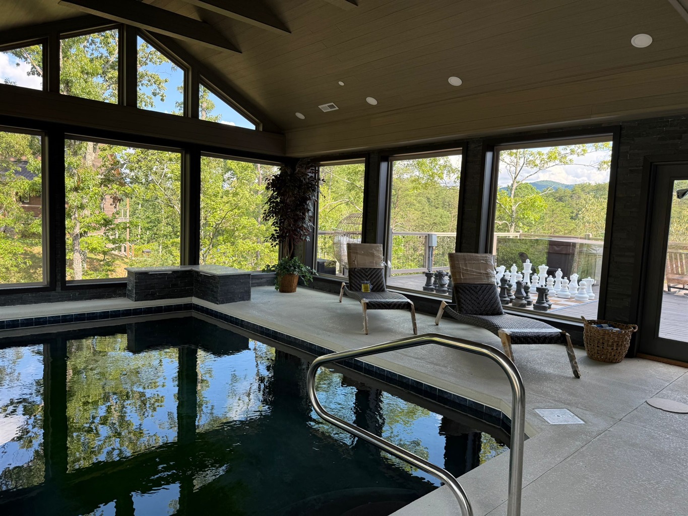 Soak it all in. This sun filled indoor pool opens to sweeping mountain and treetop views, blending spa like calm with nature’s beauty. Lounge poolside, breathe deep, and let the mountains do the rest.