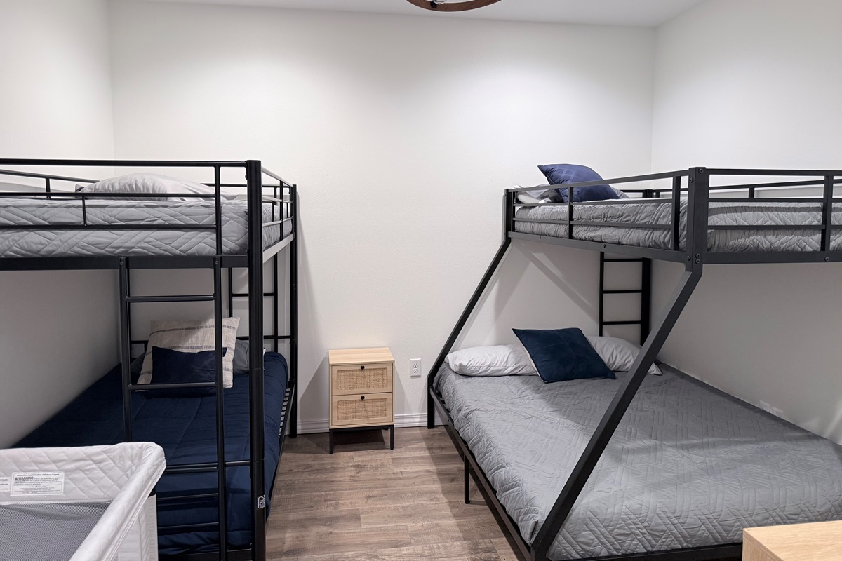 Bunk beds on right is a queen size bed