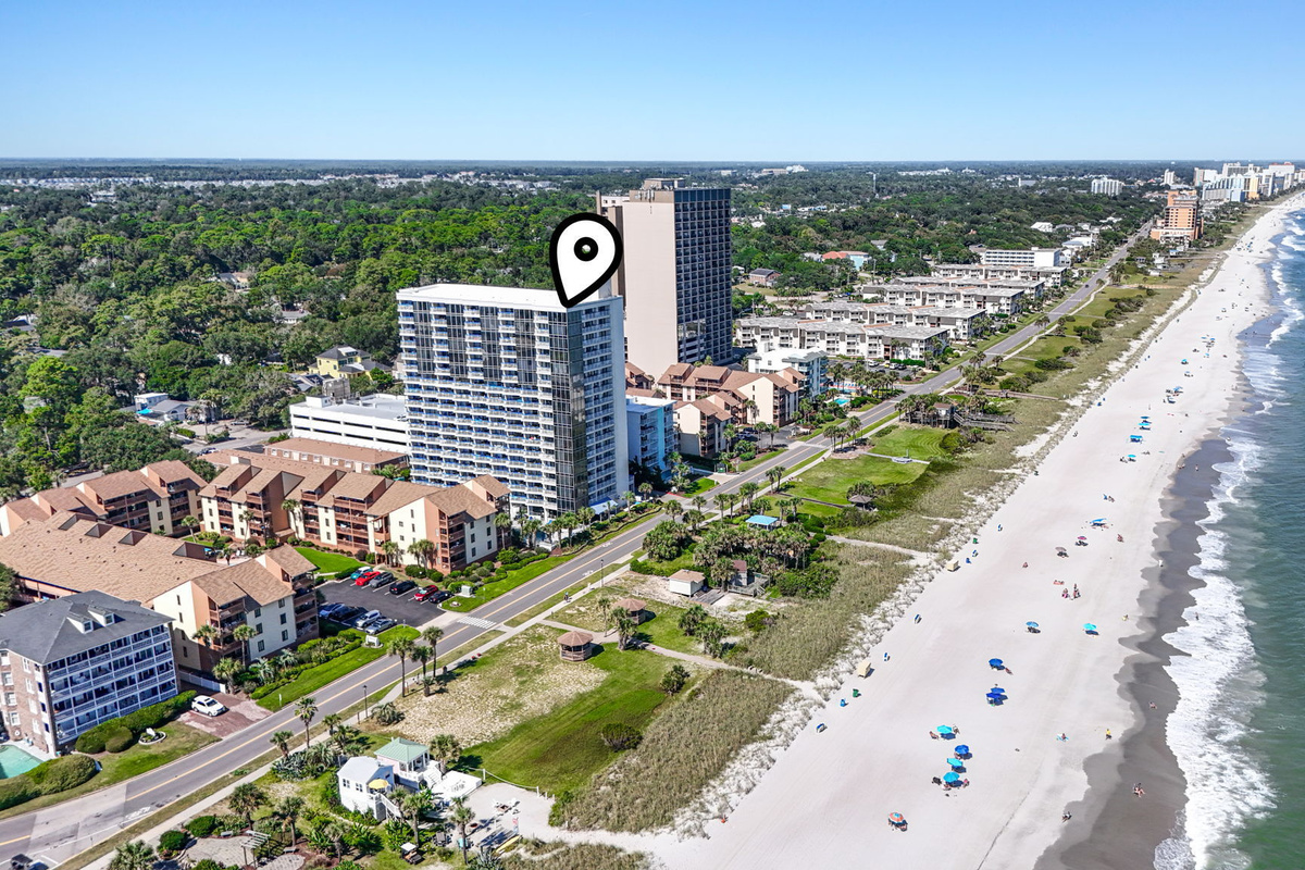 Aerial view of Forest Dunes (marked) and the beach