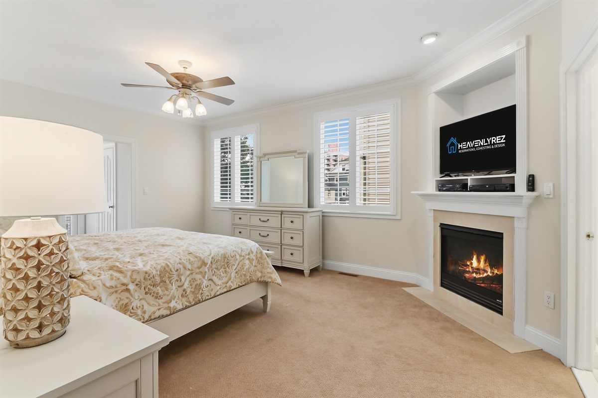 King sized bedroom with fireplace