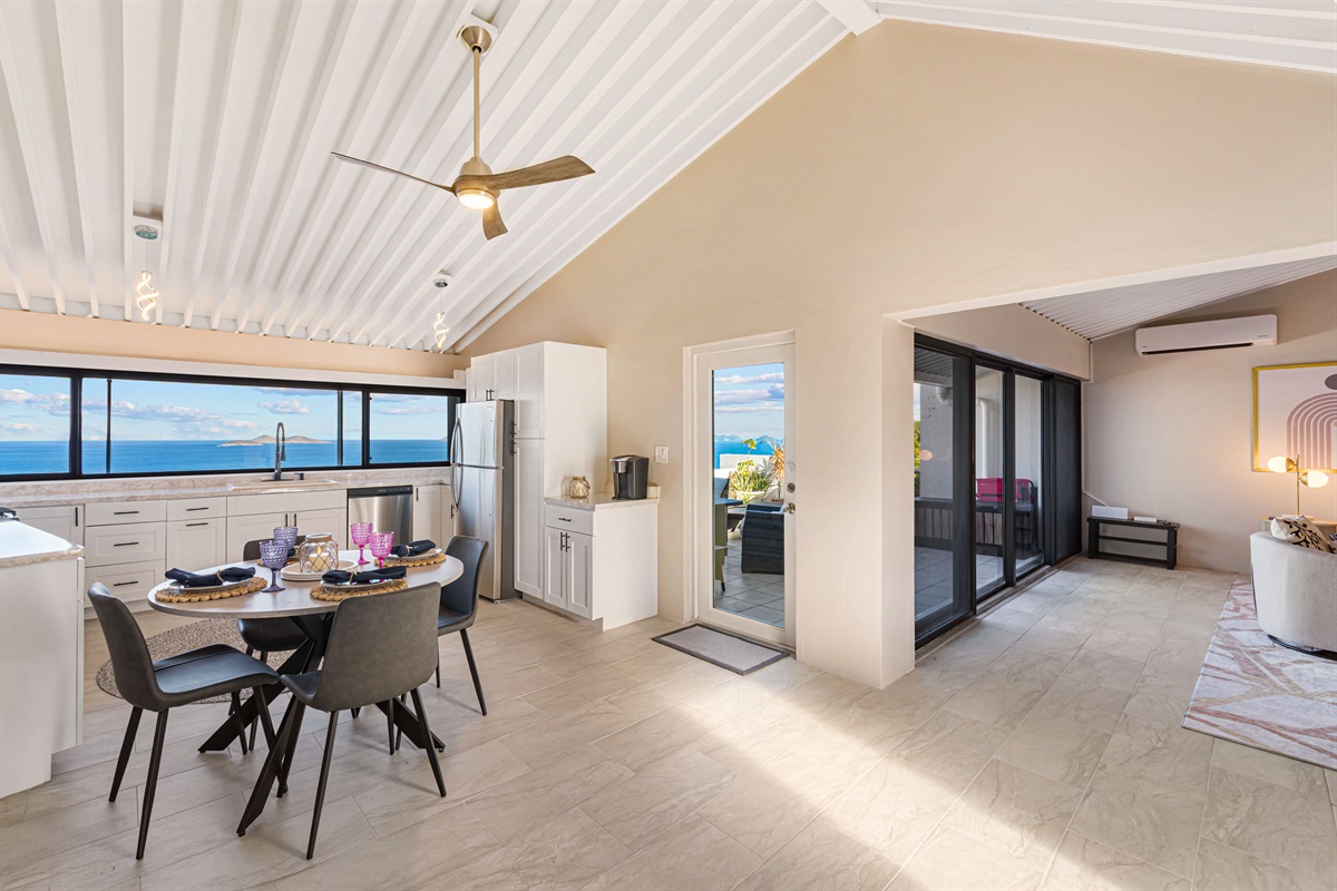 This modern kitchen is conveniently located off of the patio and living room