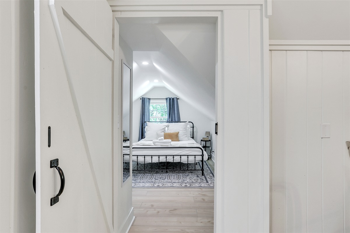 A quiet, private bedroom designed for restful nights and slow, sunny mornings.
