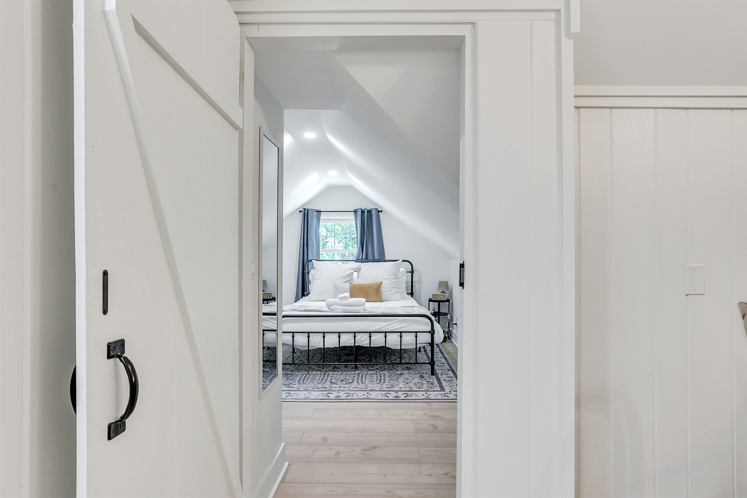 A quiet, private bedroom designed for restful nights and slow, sunny mornings.